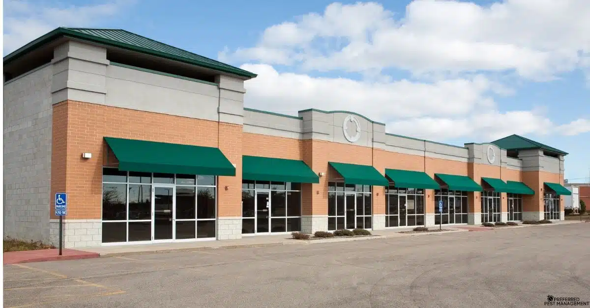 Exterior view of commercial retail buildings in Murphy TX serviced for pest control by Preferred Pest Management